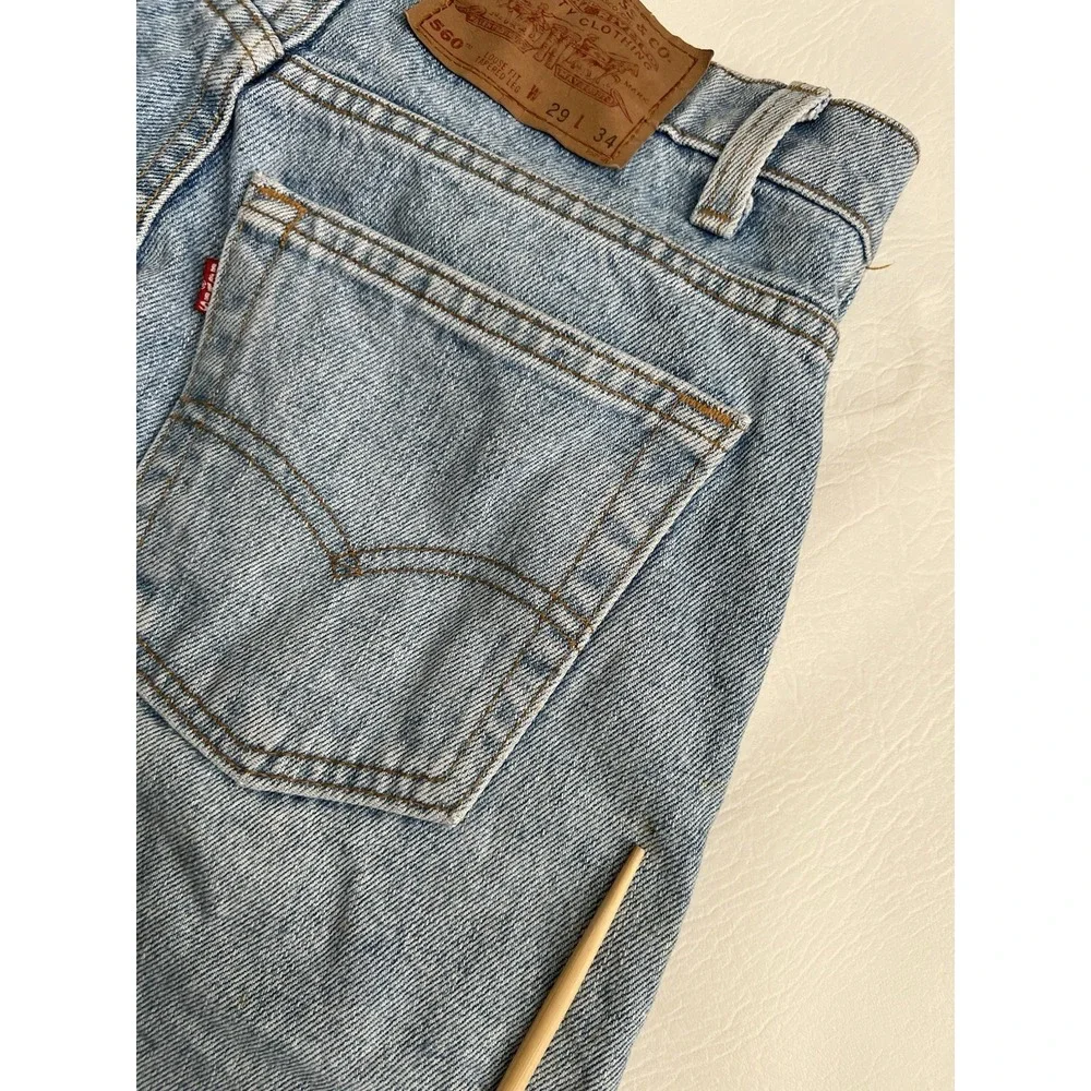 Vintage 90s Levis 560 Loose Fit Tapered Leg Jeans 29x34 Made in USA Light Wash